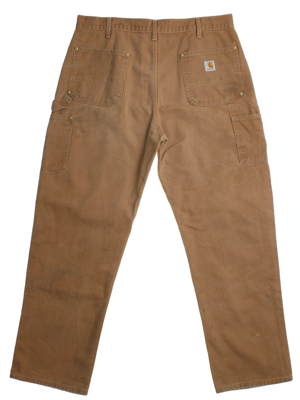 Carhartt Double Knee Jeans in a tan colourway with multiple pockets and the logo embroidered on the back.