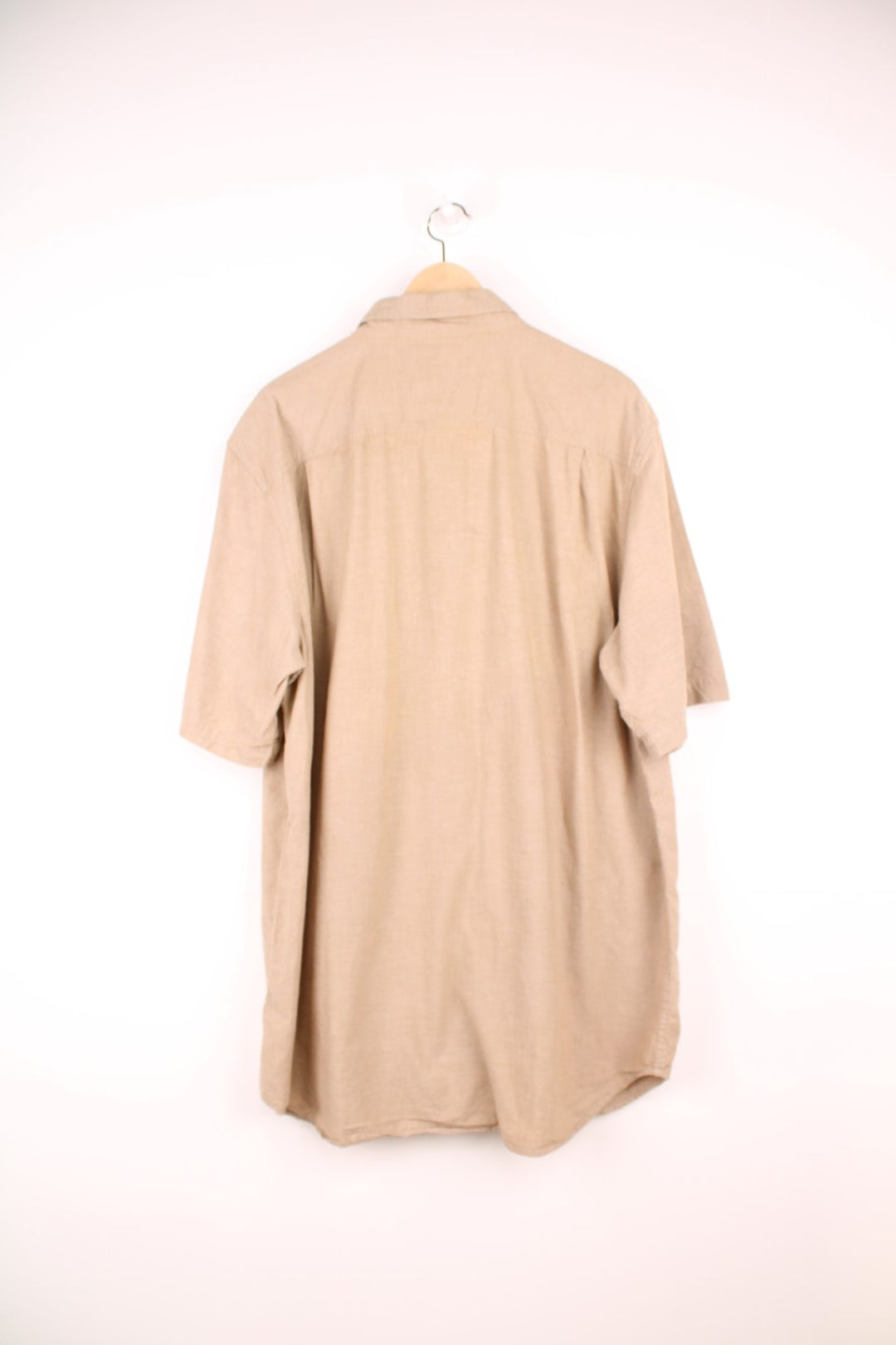 Carhartt Short Sleeve Shirt in a tanned colourway, button up, has double chest pockets and the logo embroidered on the front. 