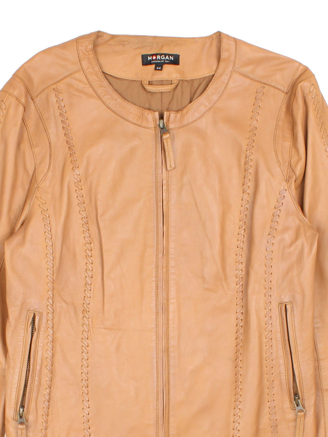 Vintage Western Style Leather Jacket in a tan colourway, zips up and has side pockets, and has cross stitching features going down the sides.