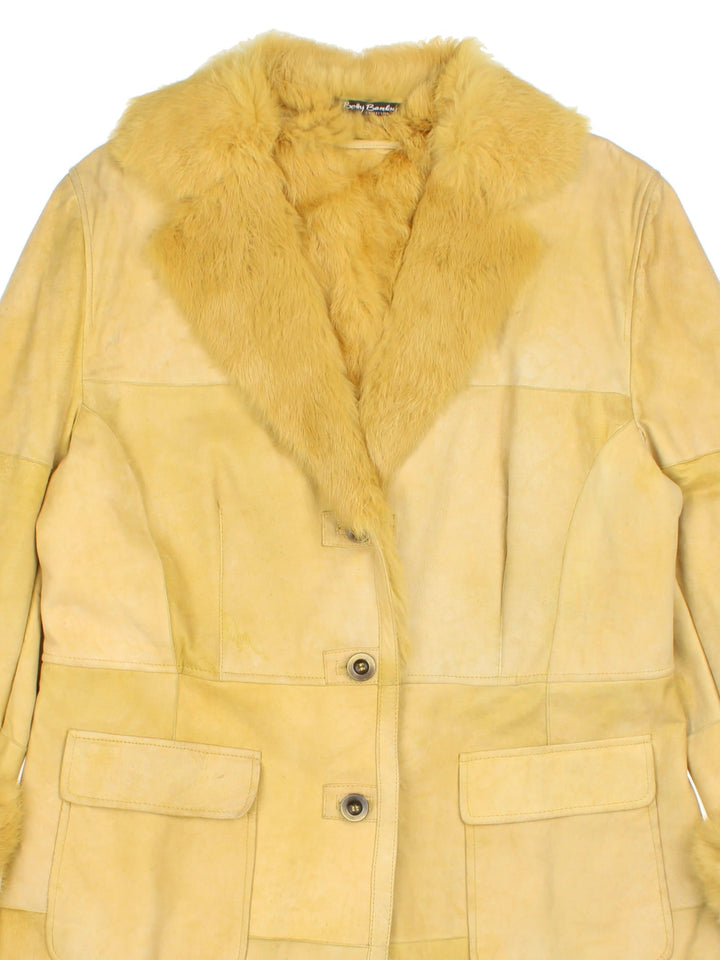 Vintage Afghan Coat in a yellow colourway, buttons up and has side pockets, and big fur collar and cuffs.
