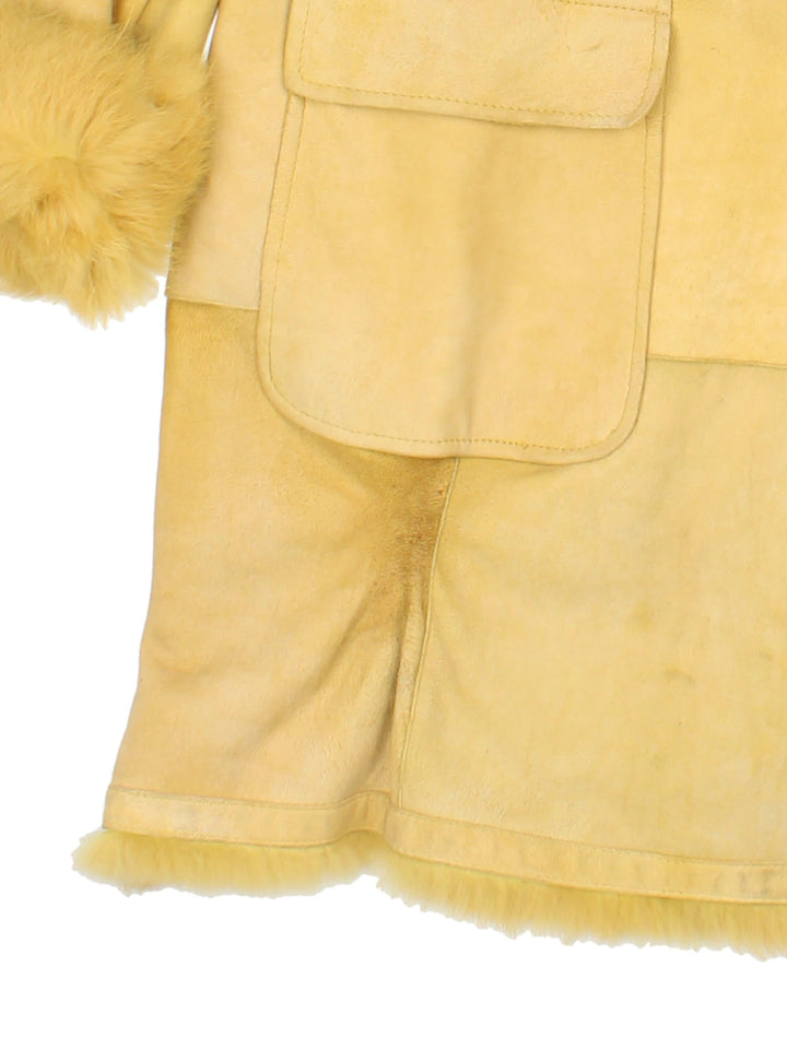 Vintage Afghan Coat in a yellow colourway, buttons up and has side pockets, and big fur collar and cuffs.