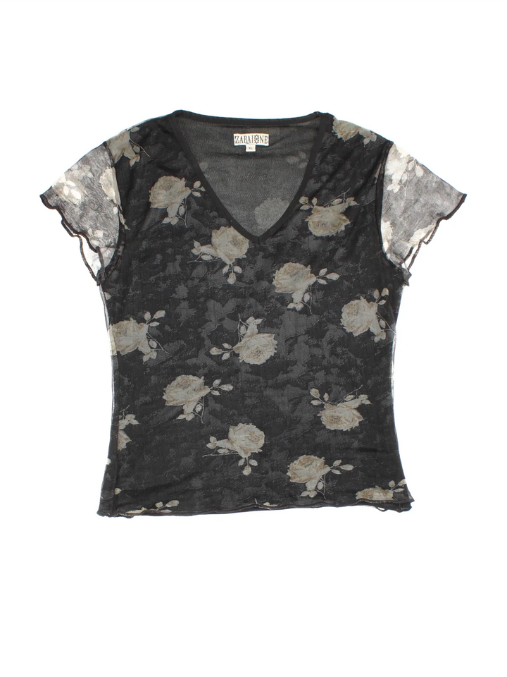 Y2K Floral Print Top in a black colourway. V neckline, sheer overlay and all over floral pattern.