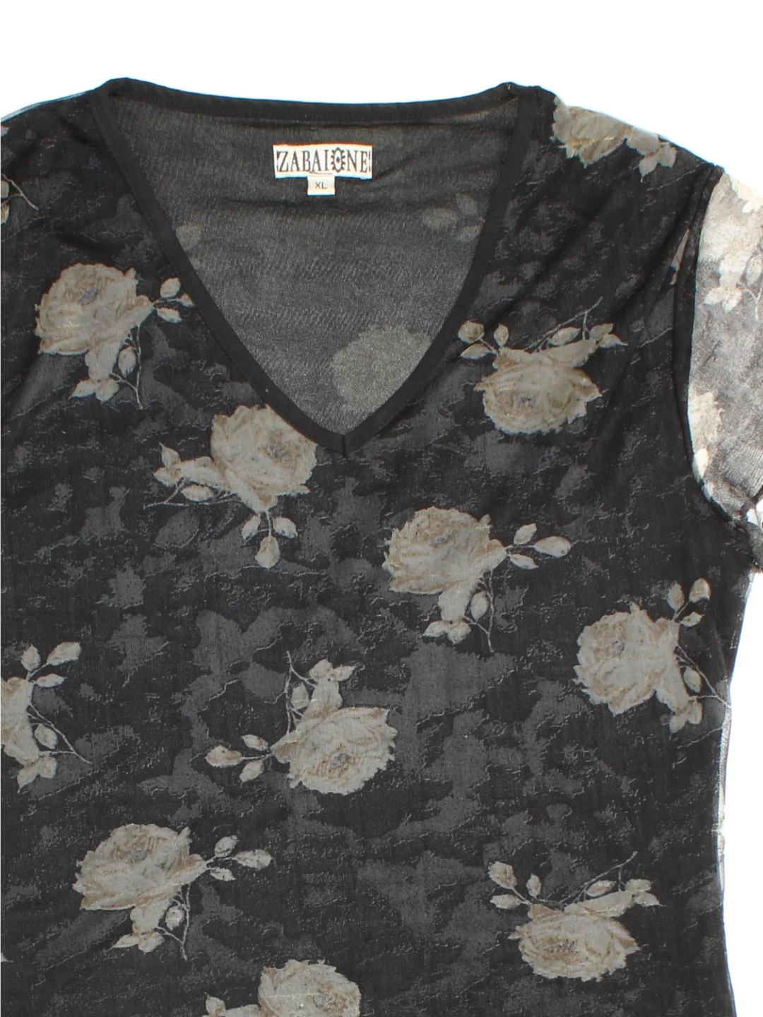 Y2K Floral Print Top in a black colourway. V neckline, sheer overlay and all over floral pattern.