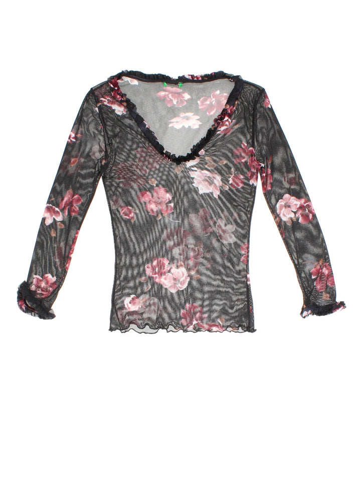Y2K Floral Mesh Top in a black/pink colourway. V neckline, frill hem and all over floral pattern.