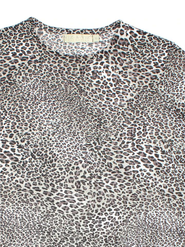 Y2K Abstract Print Top in a black/grey colourway. V neckline, frill hem and all over abstract pattern.