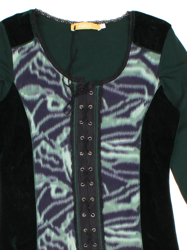 Vintage Biba Corset Top in a green colourway, round neck with lace up detail and flute sleeves.