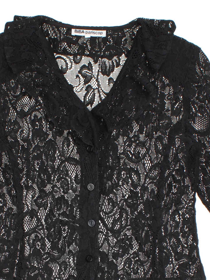 Vintage Biba Lace Blouse in a black colourway, button up with frill hem detail.