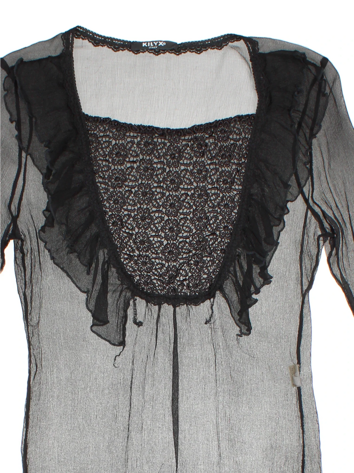 Y2K Sheer Lace Top in a black/ colourway, round neck with lace insert and frill hem detail.