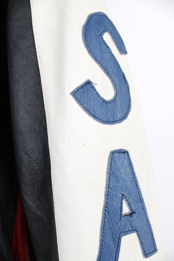 Vintage 90's style USA themed leather bomber jacket with spell-out detailing down the sleeves and USA flag on the back 