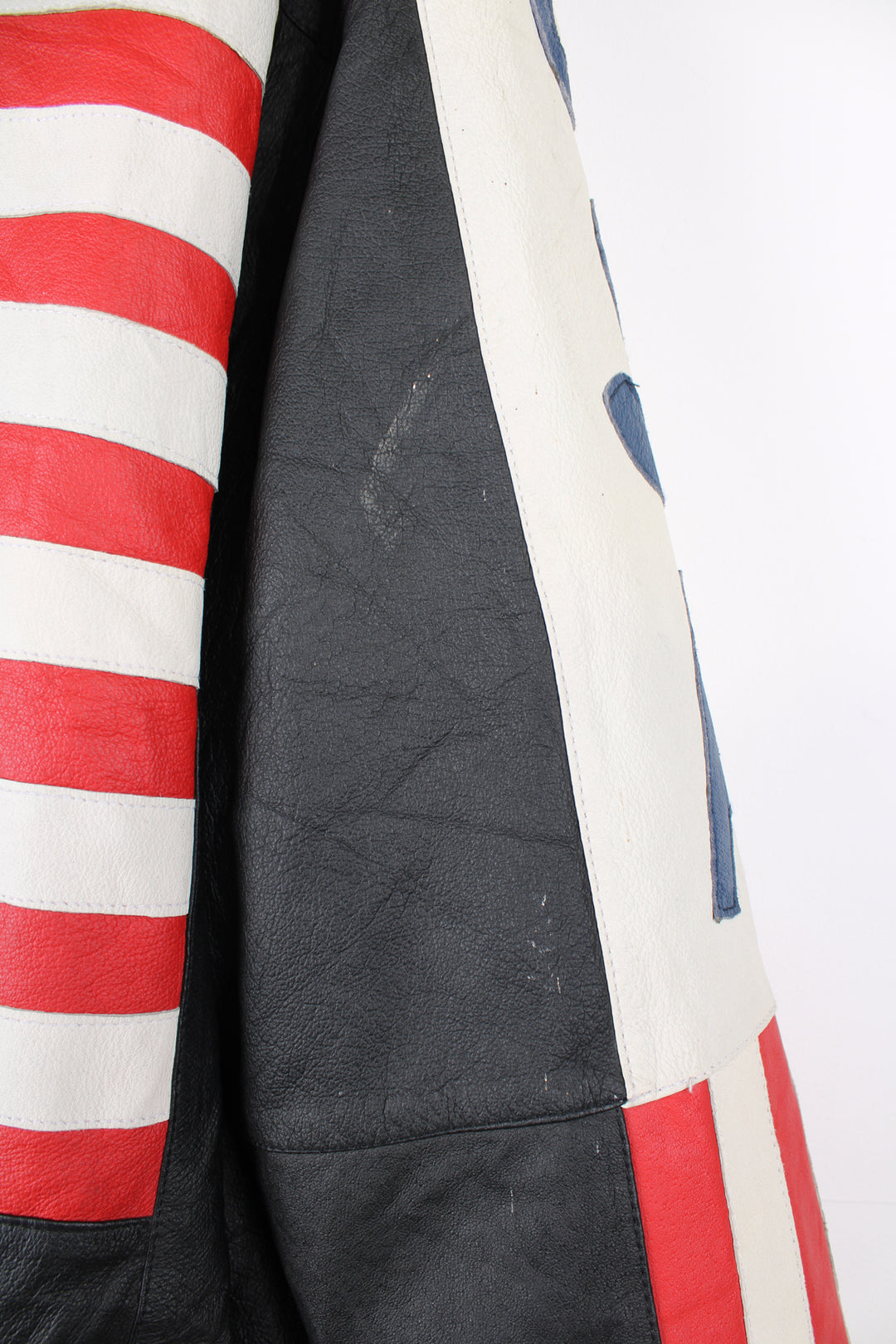 Vintage 90's style USA themed leather bomber jacket with spell-out detailing down the sleeves and USA flag on the back 
