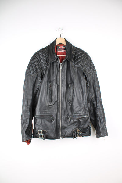 Vintage Highwayman black leather zip through biker jacket, features zip up pockets and adjustable buckle details on the hips