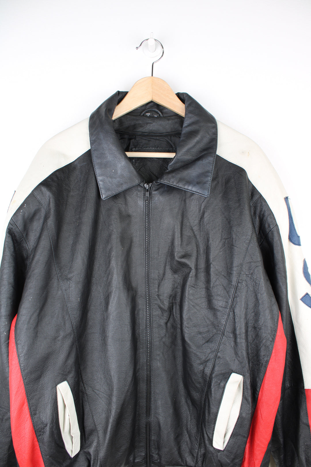 Vintage 90's style USA themed leather bomber jacket with spell-out detailing down the sleeves and USA flag on the back 