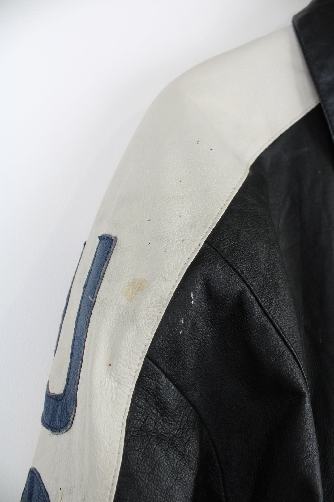 Vintage 90's style USA themed leather bomber jacket with spell-out detailing down the sleeves and USA flag on the back 