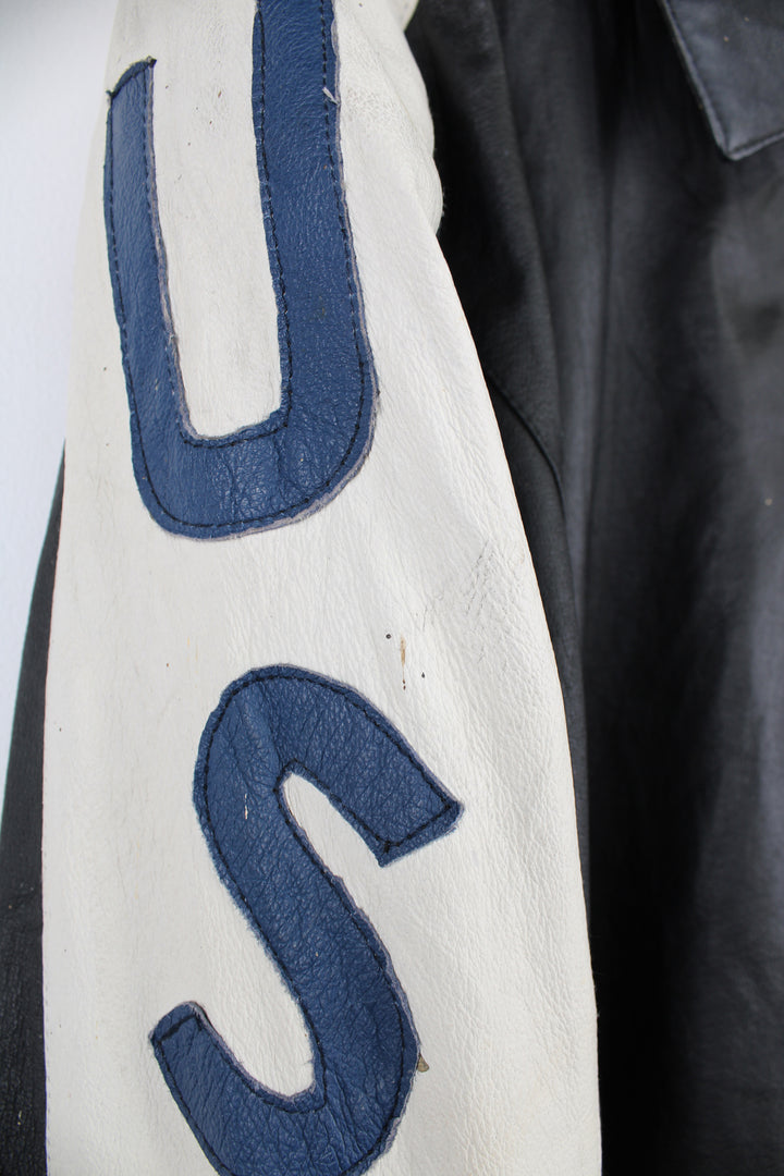 Vintage 90's style USA themed leather bomber jacket with spell-out detailing down the sleeves and USA flag on the back 