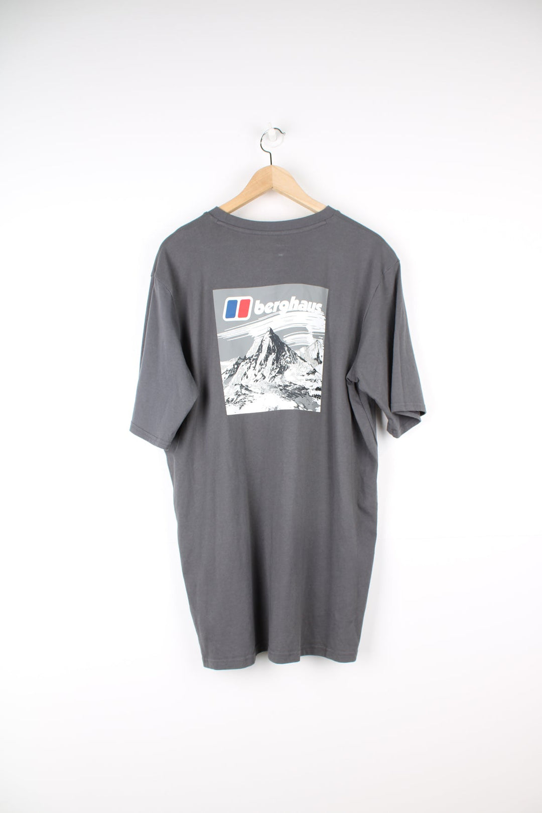 Grey Berghaus T-Shirt with printed logo on the chest and graphic print on the back.