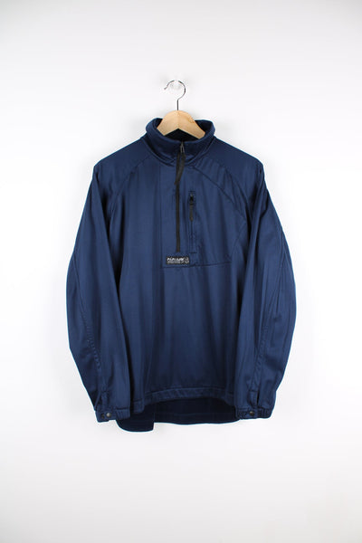 Blue reversible Paramo pullover sweatshirt with half zip and embroidered logo.