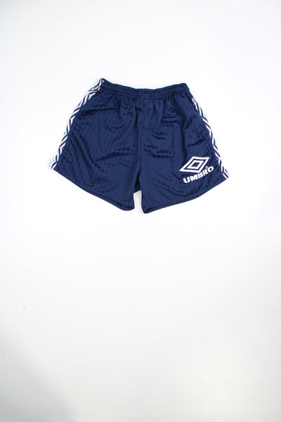 Vintage Umbro 90s blue football shorts with elasticated waist and drawstring. Features embroidered logo.