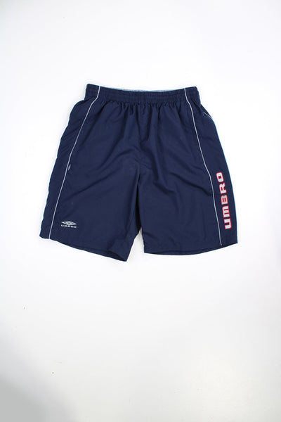 Vintage blue Umbro swim shorts with elasticated waist and drawstring. Features embroidered logo.