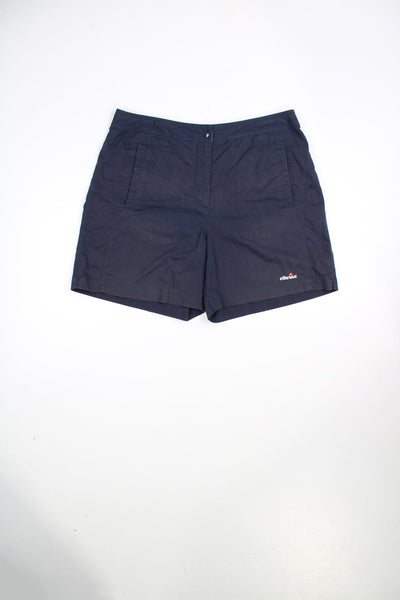 Vintage Ellesse shorts with drawstring and popper fastening. Features embroidered logo.