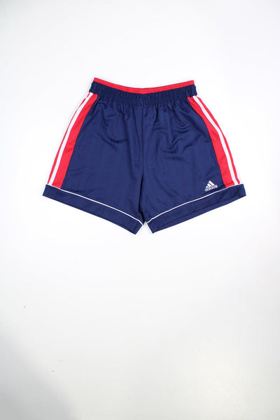 Vintage 90s Adidas shorts with elasticated waist and drawstring in blue and red. Features signature three stripes and embroidered logo.