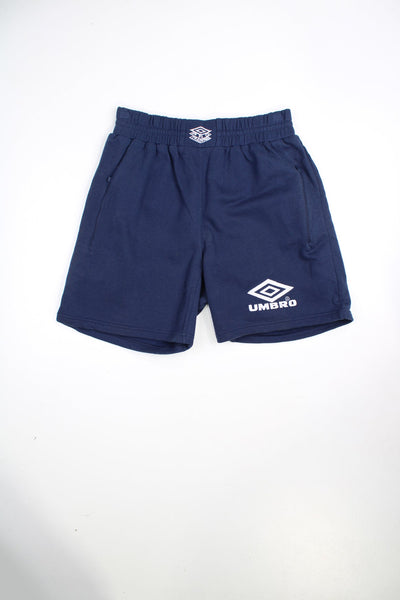 Vintage Umbro blue shorts with elasticated waist and drawstring. Features embroidered logo.