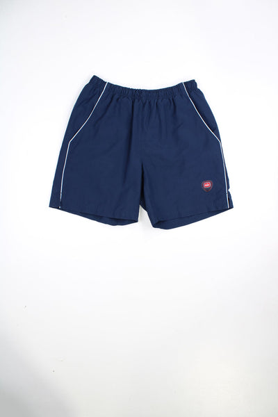 Vintage 90s Nike swim shorts with elasticated waist and drawstring. Features embroidered logo.