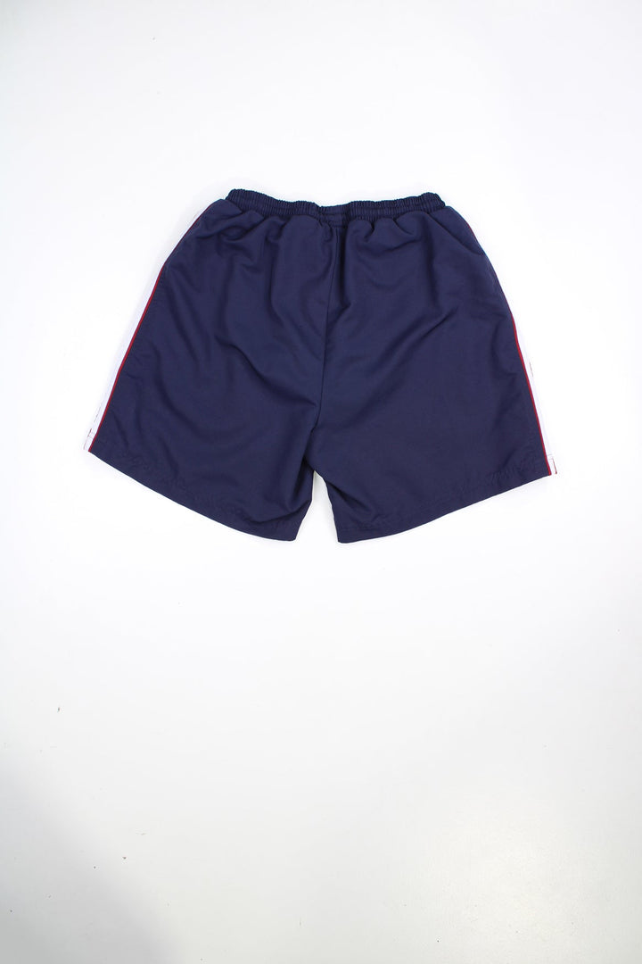 Blue and red Adidas shorts with elasticated waist and drawstring. Features signature three stripes and embroidered logo.