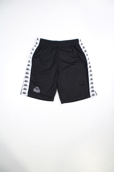 Black Kappa shorts with elasticated waistband and drawstring. Features signature branded stripe down each leg.