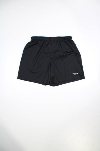 Umbro shorts with elasticated waist and drawstring. Features embroidered logo. 