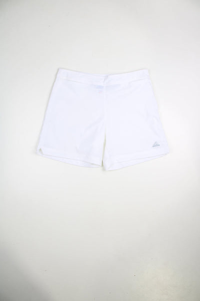 Vintage Adidas white shorts with embroidered logo and zip fastening.