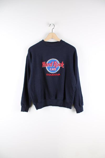 Navy Hard Rock Cafe Stockholm sweatshirt with red embroidered logo across the chest.