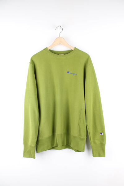 Champion Reverse Weave sweatshirt in green with embroidered logo on the chest.
