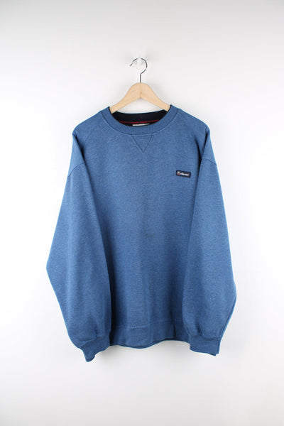Vintage Ellesse blue sweatshirt with embroidered logo on the chest.
