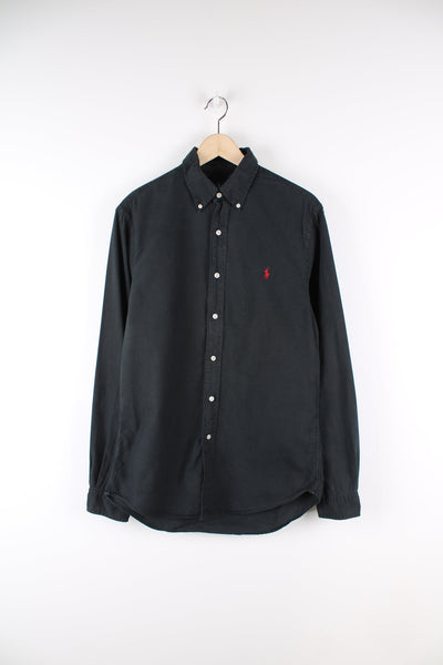 Ralph Lauren black button up shirt with red signature embroidered logo on the chest.