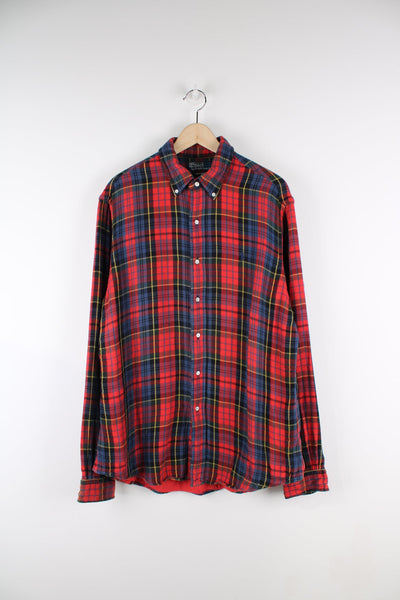 Ralph Lauren red plaid, button up flannel shirt with signature embroidered logo on the chest.