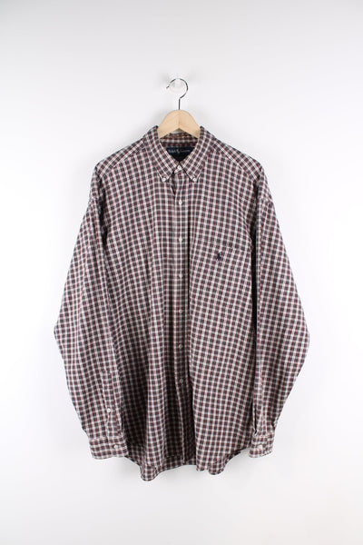 Ralph Lauren check button up shirt featuring signature embroidered logo and pocket on the chest.