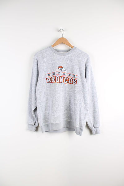 Vintage NFL Denver Broncos grey crewneck sweatshirt, features embroidered badge on the front