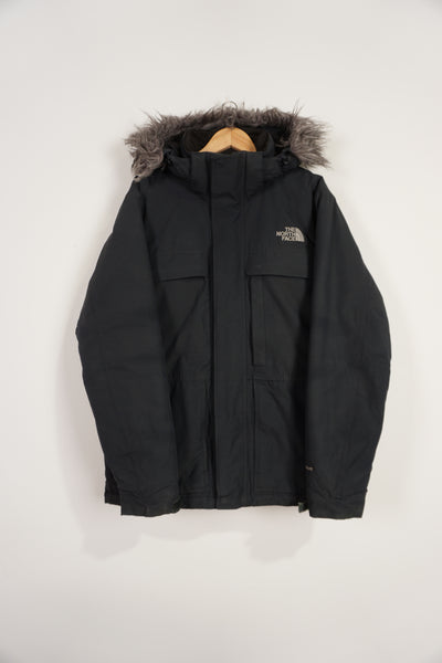 All black The North Face zip through HyVent jacket with embroidered logo, multiple pockets and detachable hood
