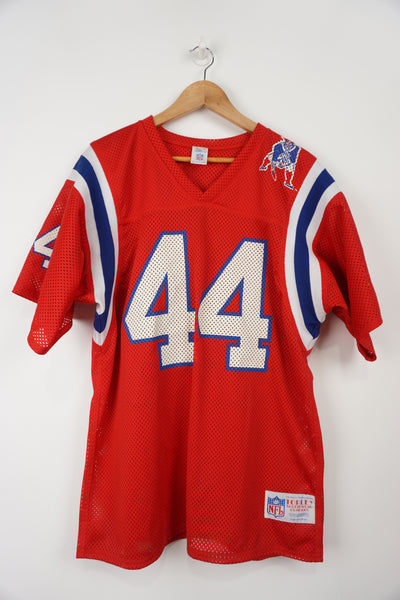 New England Patriots Pro Cut Football Jersey Officially Licensed NFL 1990 Product. Printed logo and number front and back. Official NFL Made in Great Britain label in collar Jersey in good condition for age, yellowing on front and back numbers Size in Label: M