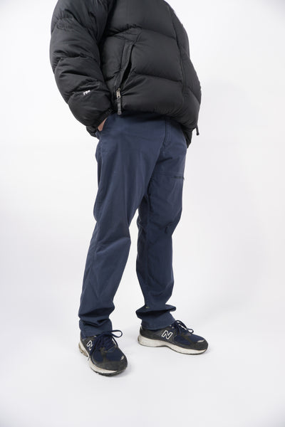 Navy blue The North Face tech trousers with zip up leg pocket and embroidered logo on the waistband