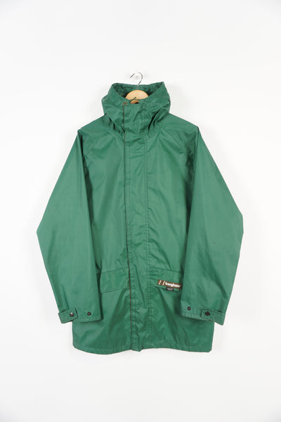 Berghaus green zip through waterproof jacket with embroidered logo on the pocket and hood