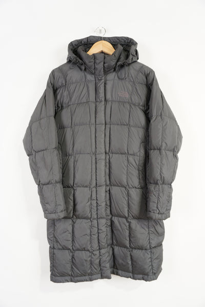 The North Face grey 600 hooded puffer jacket with double pockets and embroidered logos on the front and back 