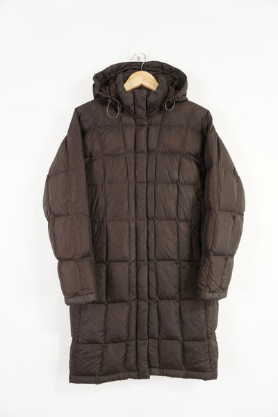 The North Face brown 600 hooded puffer jacket with double pockets and embroidered logos on the front and back 