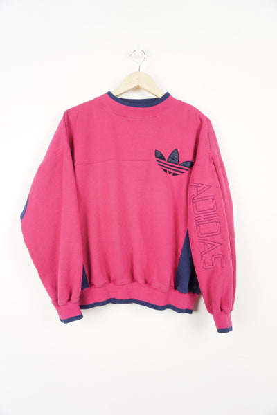 90's pink Adidas crewneck sweatshirt with embroidered logo on chest and details on sleeve