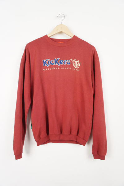 Red sweatshirt with embroidered Kickers sellout on the chest