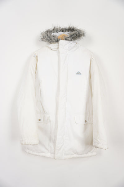 All white Reebok winter coat with metal logo plaque, multiple pockets and faux fur trim hood 