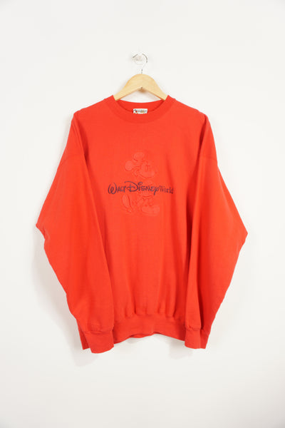 Vintage Disney red crewneck sweatshirt with embossed Mickey Mouse and embroidered text