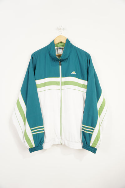 90's Teal Adidas zip through tracksuit top with green details and embroidered logo on the chest. "Tennis Club Sommerbostel" raised lettering on&nbsp;reverse good condition: slight discolouration on lettering Size in Label: L 