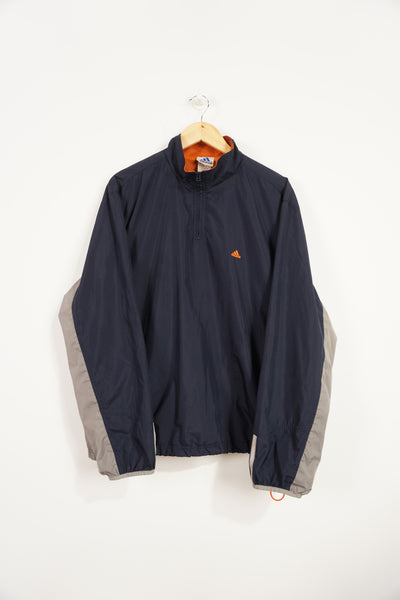 90's Navy Adidas 1/4 zip tracksuit top with orange and grey details and embroidered logo on the chest good condition: Size in Label: L