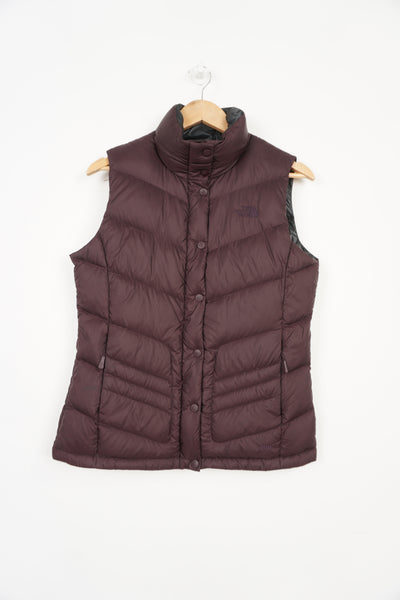 The North Face 700 purple zip through gilet with embroidered logo on the chest